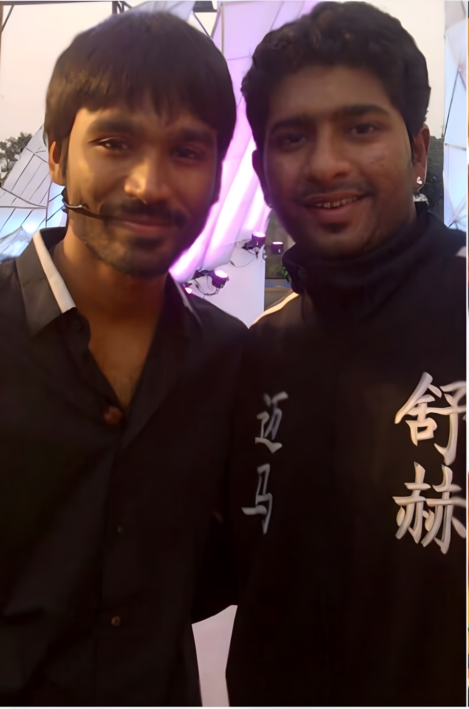 Our founder with Dhanush at a show